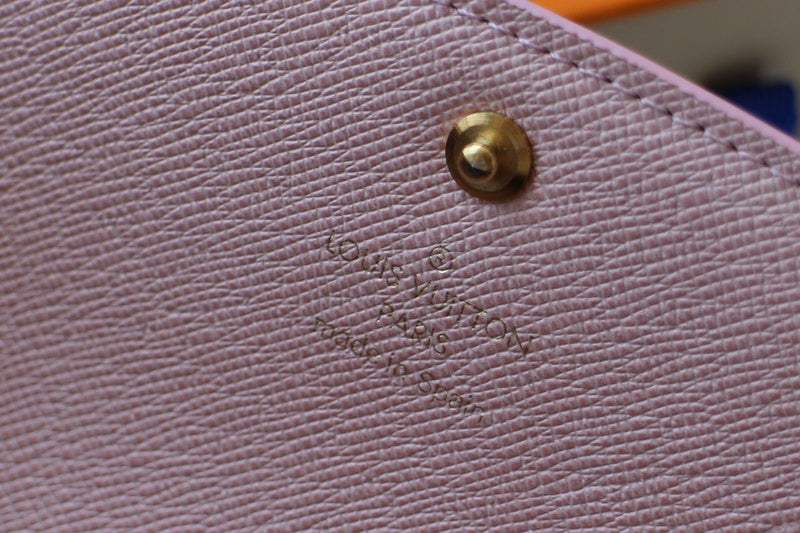 Back view of structured classic women's handbag – women's luxury accessory