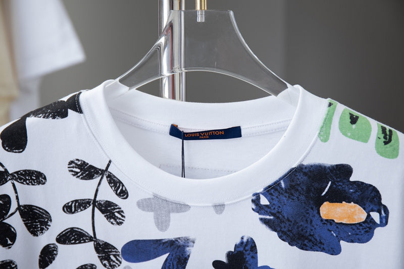 Close-up detail shot of Louis Vuitton cotton t-shirt with signature branding