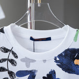 Close-up detail shot of Louis Vuitton cotton t-shirt with signature branding