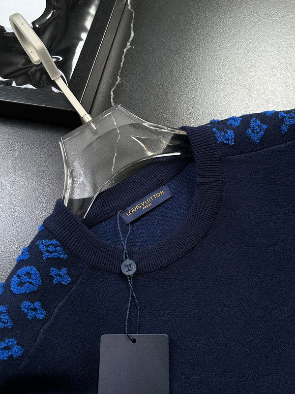 Close-up detail shot of Louis Vuitton luxury clothing with contemporary cut