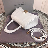 Styled lifestyle shot of statement refined women's handbag – women's premium purse