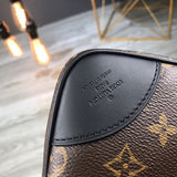 Back view of classic sleek women's handbag – women's statement bag