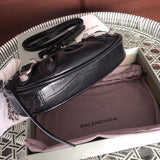 Side profile of everyday-luxe polished women's handbag – women's luxury accessory
