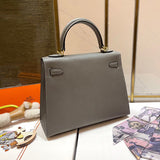Side view of streamlined structured handbag