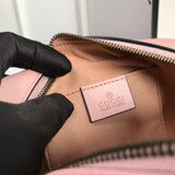 Side profile of elevated sleek women's handbag – women's luxury accessory