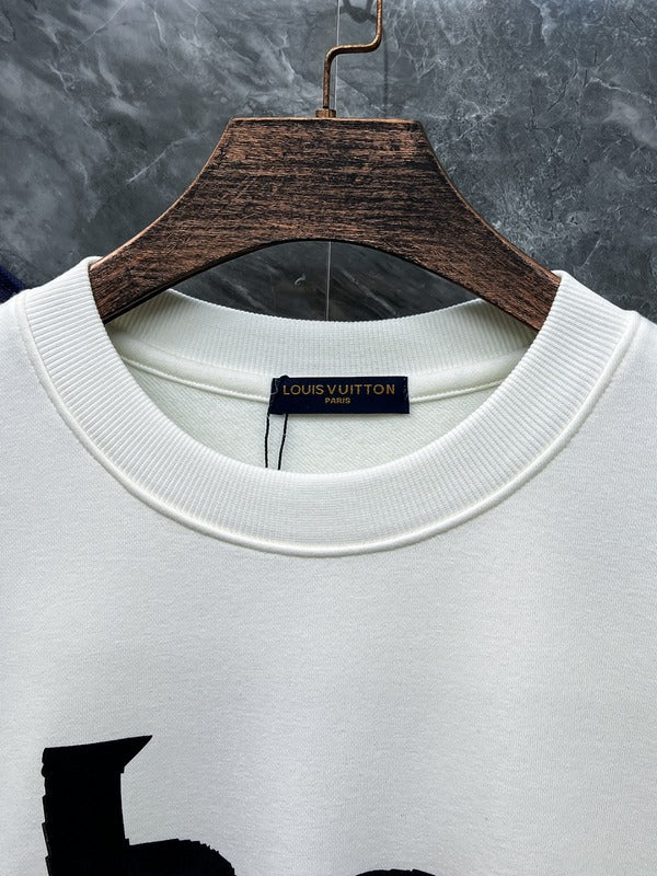 Front view of Louis Vuitton luxury clothing with tailored silhouette