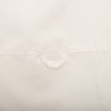 Flat lay presentation of Louis Vuitton luxury clothing with logo-detail design