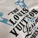 Flat lay presentation of Louis Vuitton luxury clothing with tailored silhouette