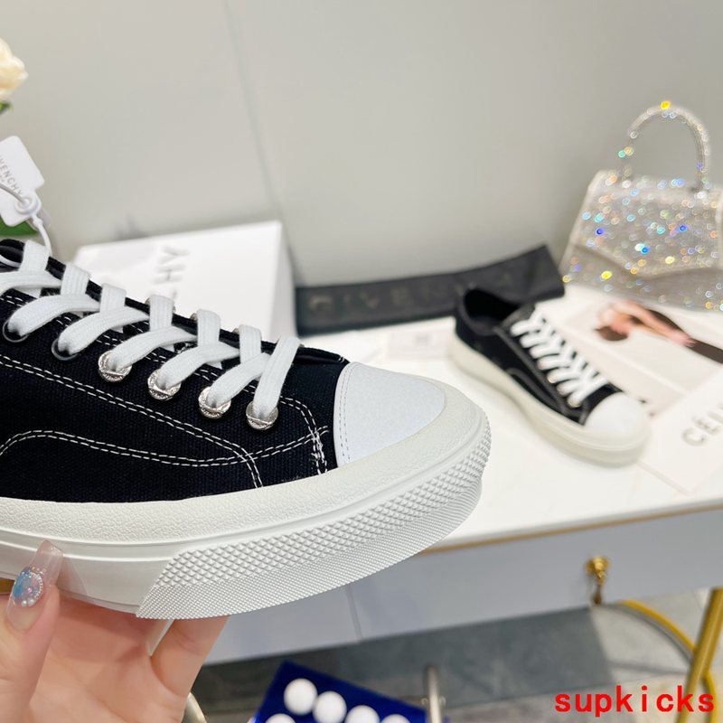 Givenchy Black Low-Top Sneakers - Close-Up Texture View