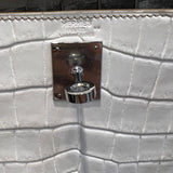 Side view of curated structured handbag