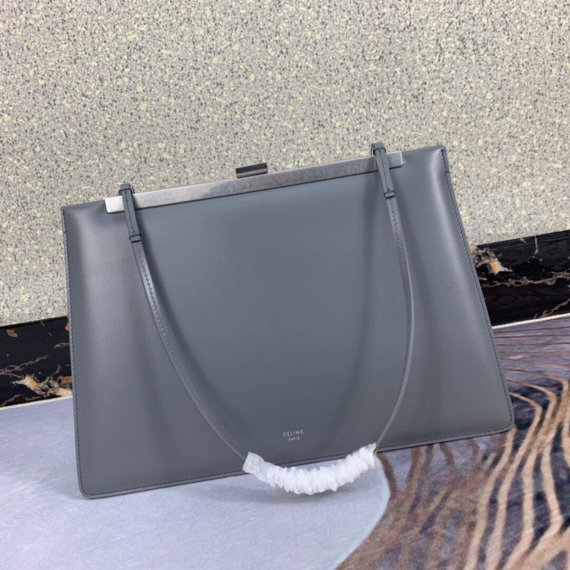 Front view of elevated polished women's handbag – women's statement bag