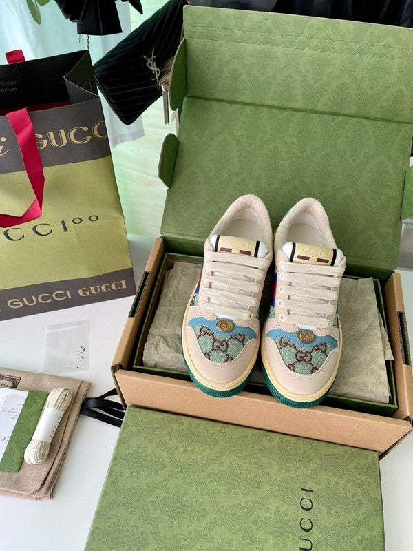 Side profile of Gucci soft grey sneakers chunky sole construction