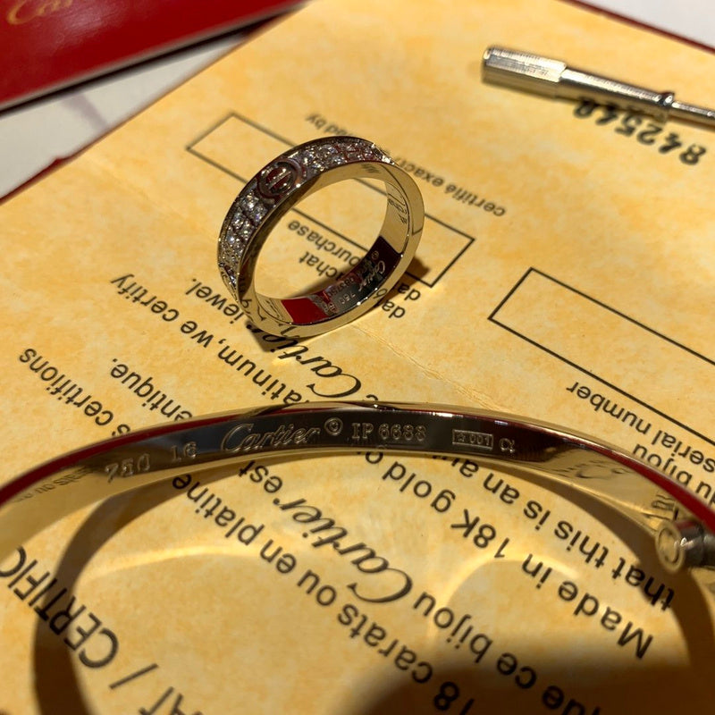 Side view of Cartier unisex jewelry piece