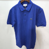Back view of Lacoste luxury clothing with monogram-inspired silhouette
