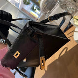  classic shoulder bag styled with outfit