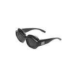 Close-up of Balenciaga sunglasses hardware and fine stitching