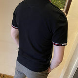 Back view of Moncler luxury clothing with tailored silhouette