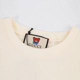 Close-up detail shot of Gucci luxury clothing with everyday silhouette
