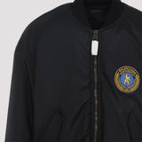 Close-up of Balenciaga outerwear hardware and fine stitching
