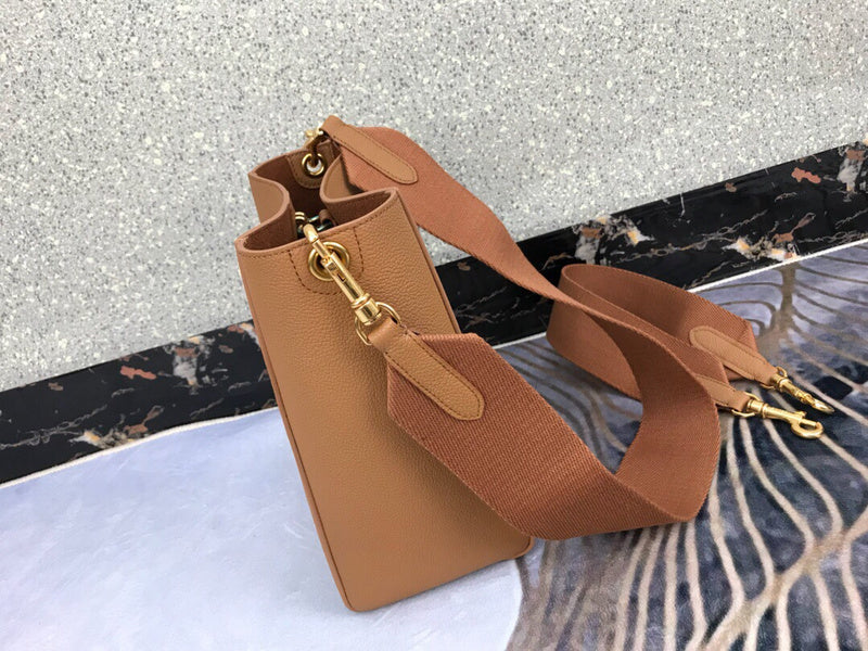 Styled lifestyle shot of structured statement women's handbag – women's designer-style accessory