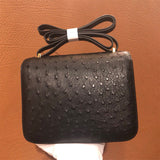 Side view of considered structured handbag