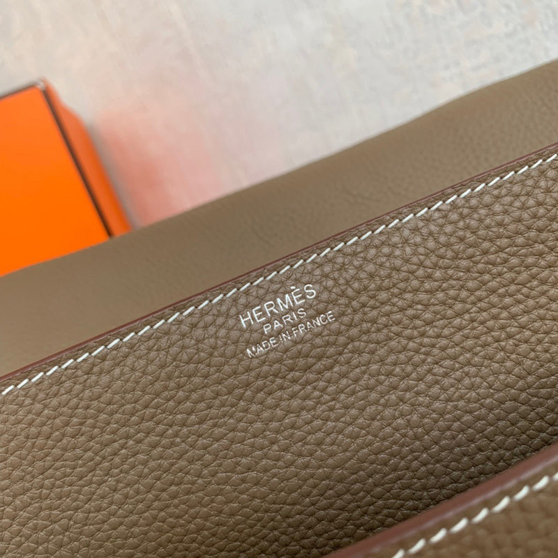 Side view of sleek structured handbag