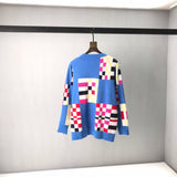 Side profile of Louis Vuitton luxury clothing with logo-detail design
