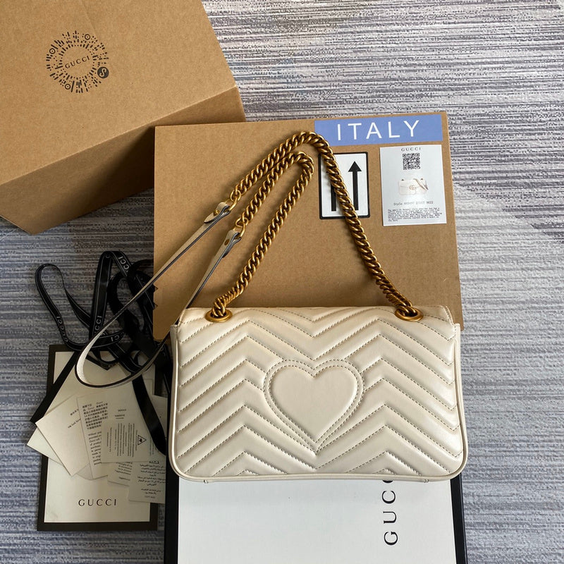 Front view of signature polished women's handbag – women's designer-style accessory