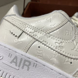 Side profile of Nike clean off-white sneakers chunky sole construction