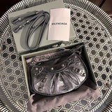 Front view of refined sleek women's handbag – women's statement bag