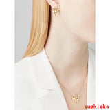 Front view of Van Cleef & Arpels unisex jewelry piece