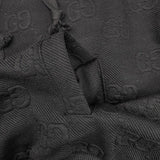 Front view of Gucci luxury clothing with label-forward styling