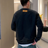 Full styled look of Louis Vuitton luxury clothing with relaxed-fit cut