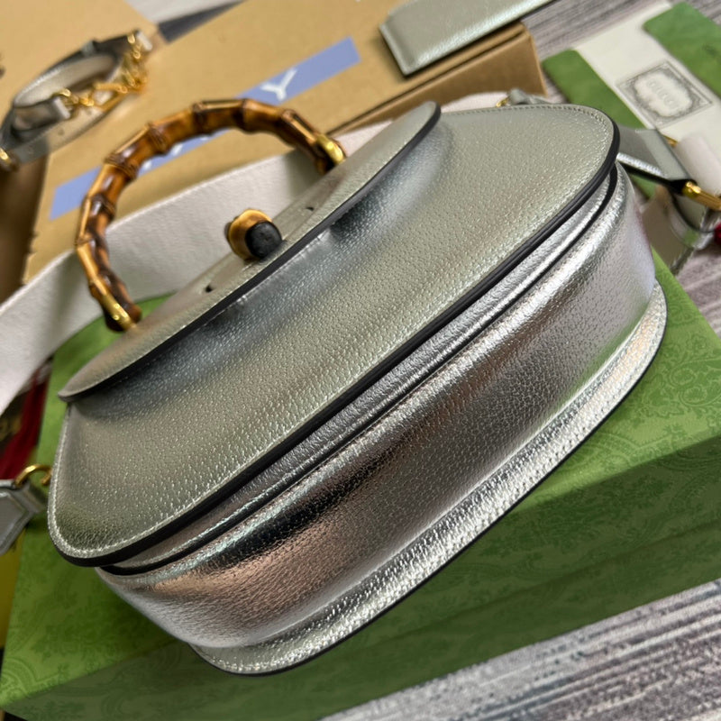 Styled lifestyle shot of refined sleek women's handbag – women's luxury handbag