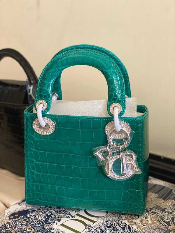 Styled lifestyle shot of everyday-luxe structured women's handbag – women's everyday handbag