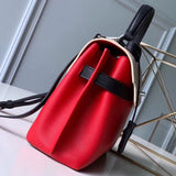 Interior view of chic polished women's handbag – women's statement bag