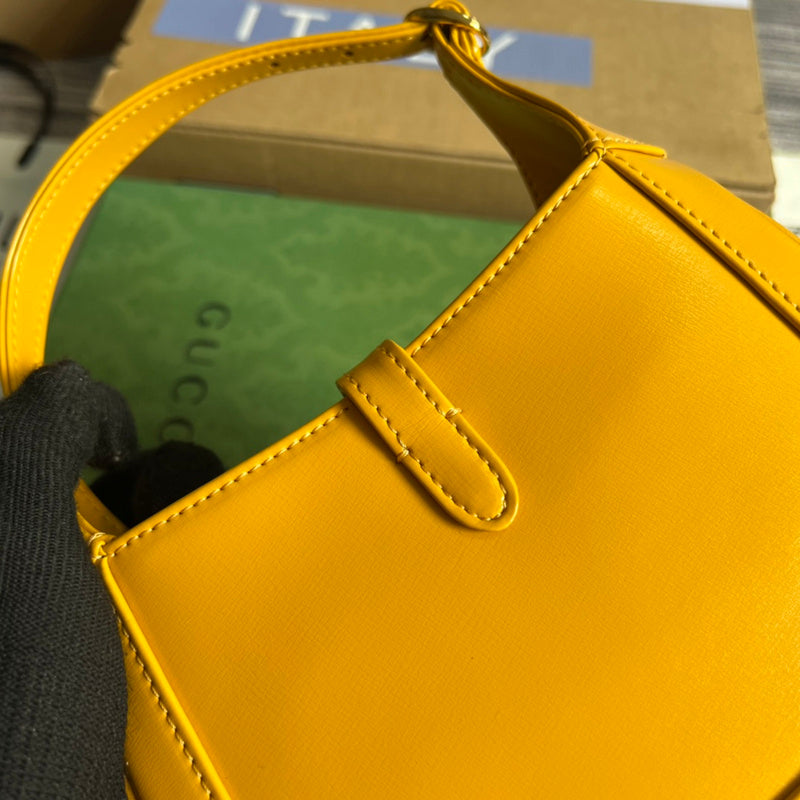 Styled lifestyle shot of polished structured women's handbag – women's luxury handbag