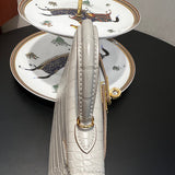 Polished bag shown from front angle