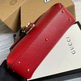 Handle and strap detail of polished modern women's handbag – women's luxury accessory