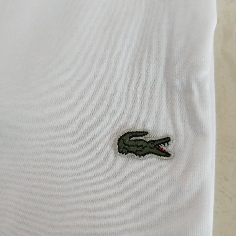 Full styled look of Lacoste luxury clothing with logo-detail design