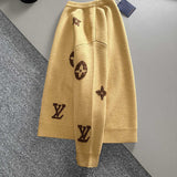Side profile of Louis Vuitton luxury clothing with signature branding