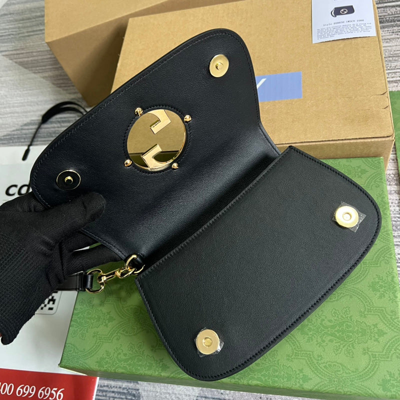 Styled lifestyle shot of sleek polished women's handbag – women's statement bag