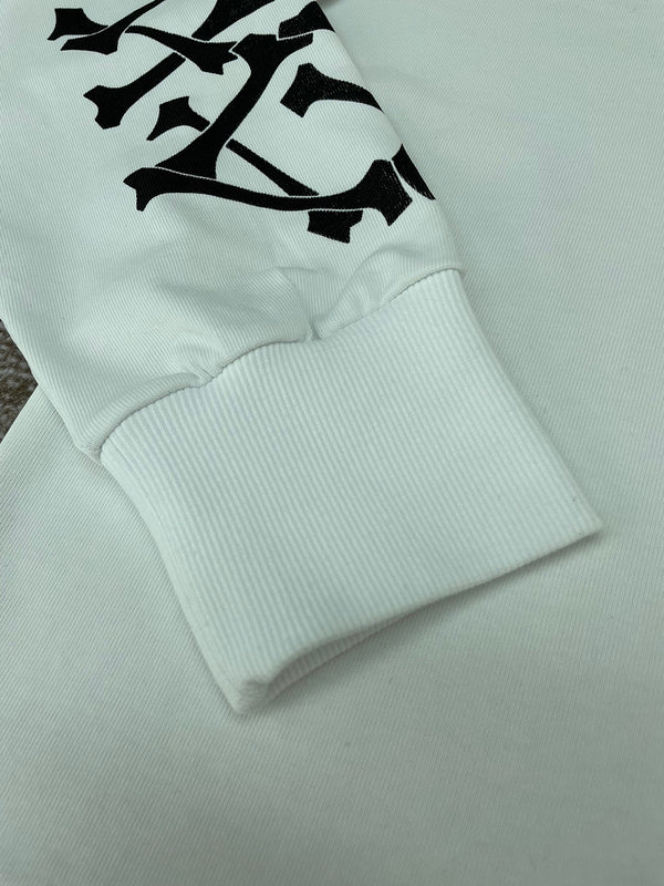 Three-quarter angle view of Amiri luxury piece style No.061