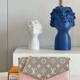Front view of elevated refined women's handbag – women's designer-style accessory