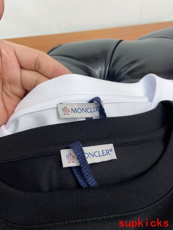 Back view of Moncler luxury clothing with contemporary cut