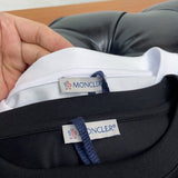 Back view of Moncler luxury clothing with contemporary cut