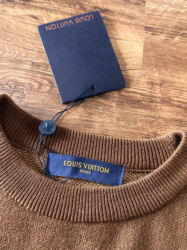 Front view of Louis Vuitton luxury clothing with logo-detail design