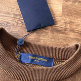 Front view of Louis Vuitton luxury clothing with logo-detail design