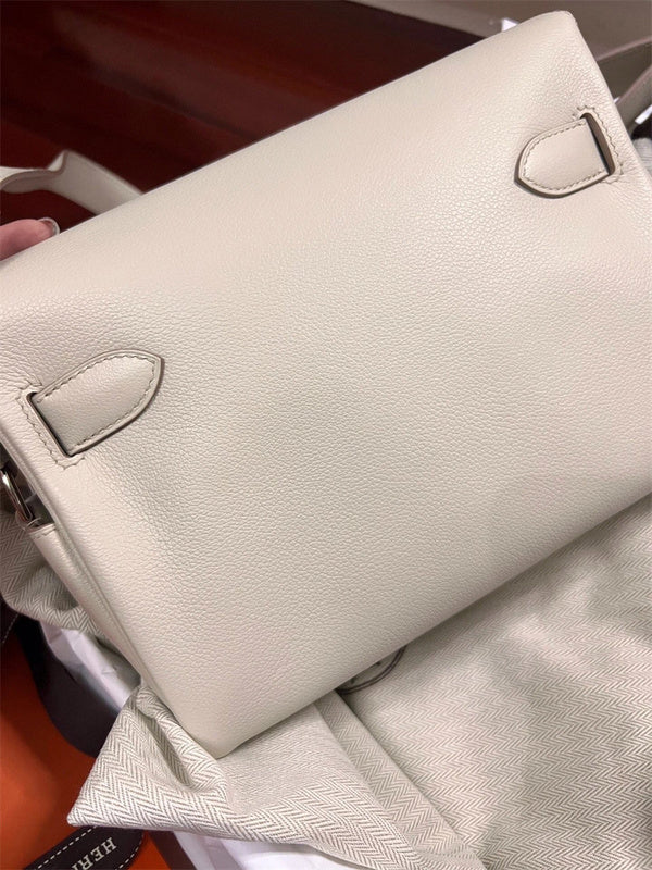  Structured crossbody bag carried on shoulder 10