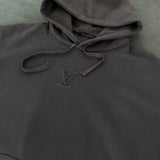 Front view of Louis Vuitton luxury clothing with everyday silhouette